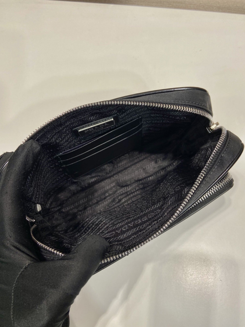 Pra*a clutch bags